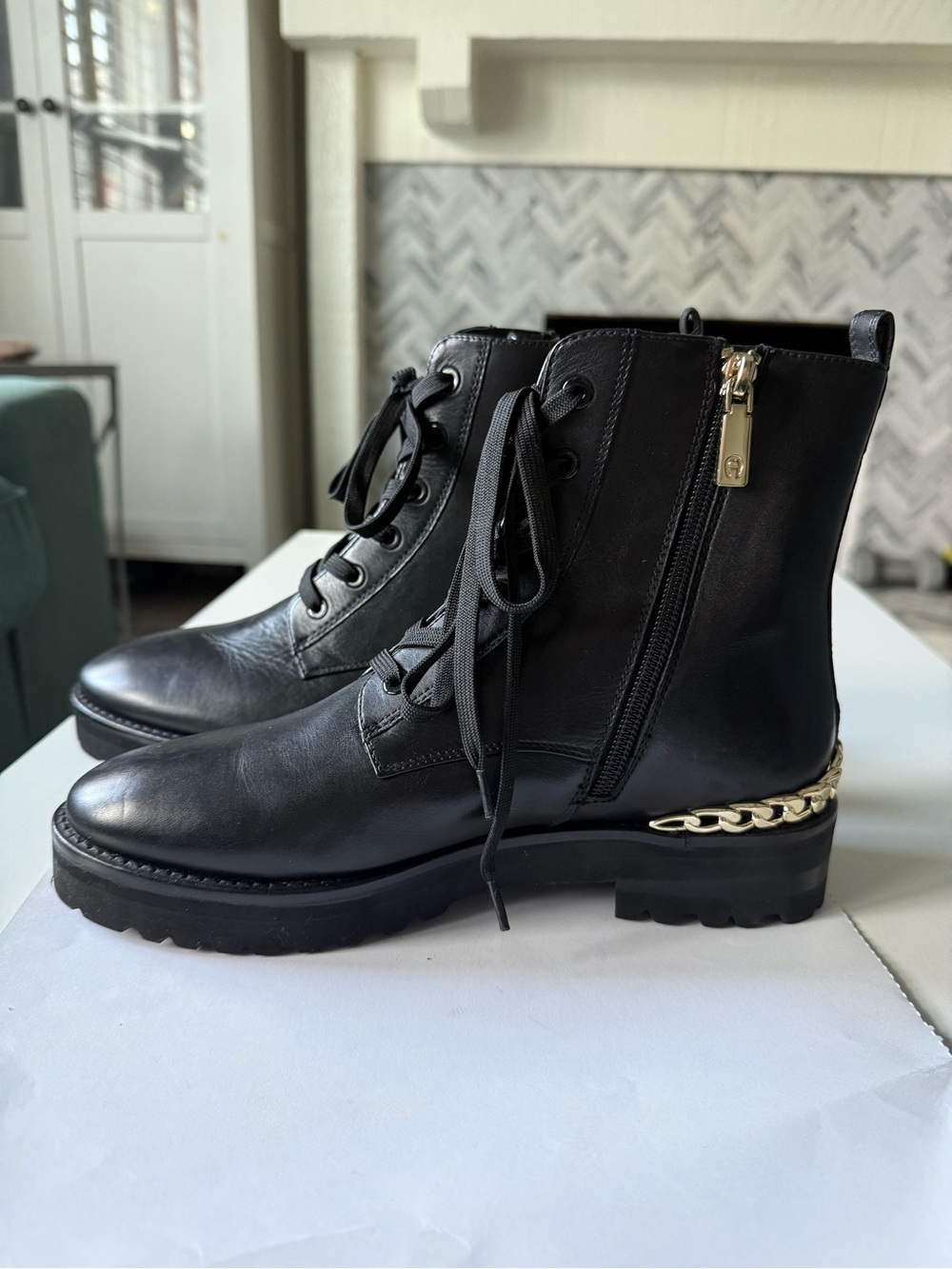 Etienne Aigner Black Ankle Booties with Gold Chain Trim